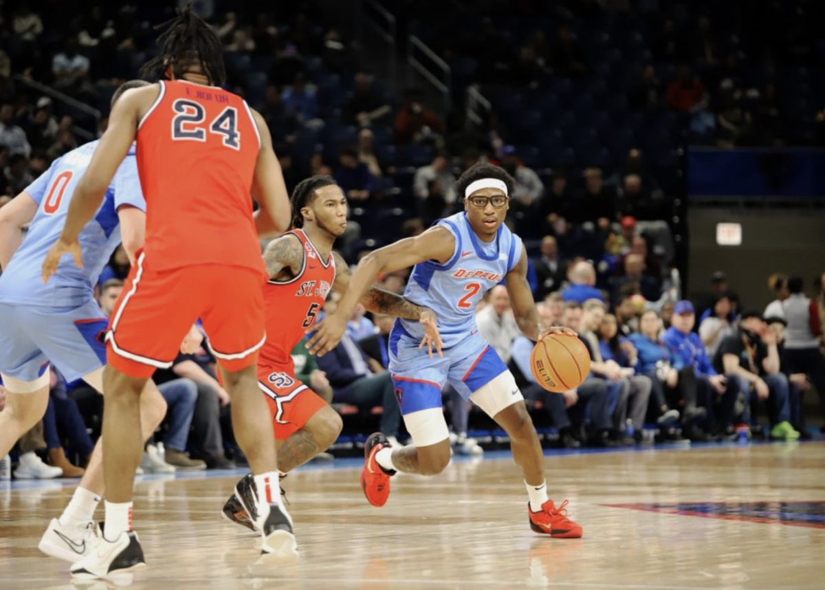 Layden Blocker dribbles around St. Johns on Wednesday, Feb. 19, 2025, at Wintrust Arena. DePaul is on a four game losing streak.